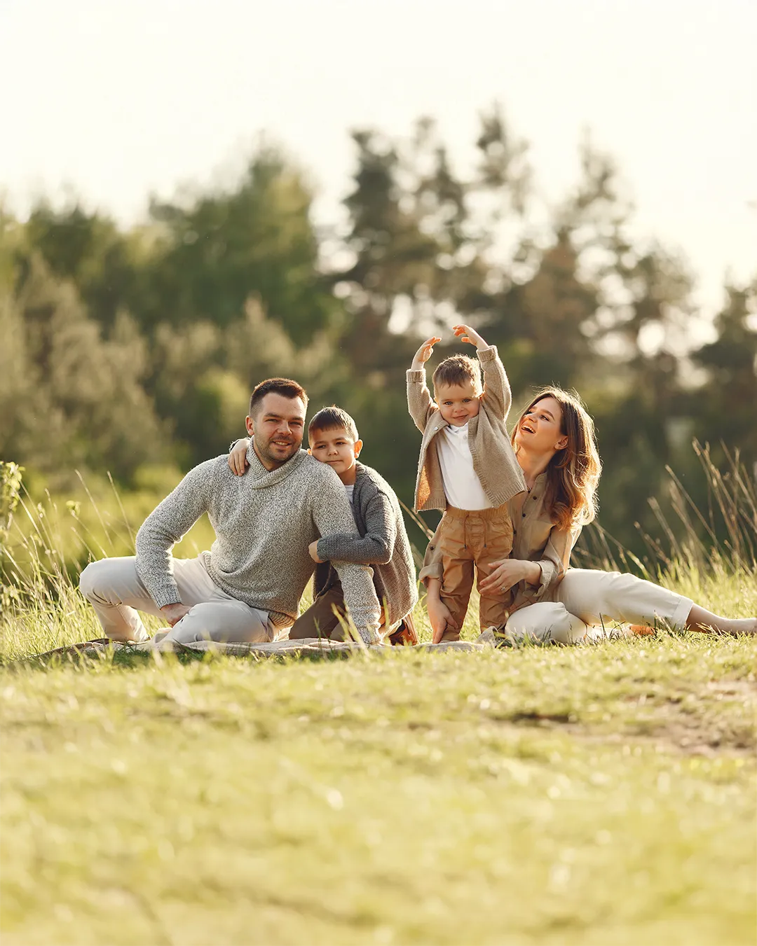 A custom wooden puzzle featuring a joyful family of four sitting outdoors on a green field. The image captures a heartwarming moment, ideal for a personalized gift, perfect for family bonding or special occasions like birthdays and anniversaries