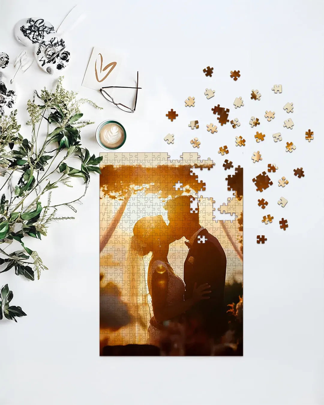 A partially assembled personalized wooden puzzle featuring a romantic wedding photo of a couple sharing a sunset kiss. The warm golden tones and intimate moment make this puzzle an ideal keepsake or gift for weddings and anniversaries, offering a meaningful way to preserve special memories